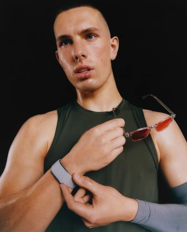 Man in a green athletic top